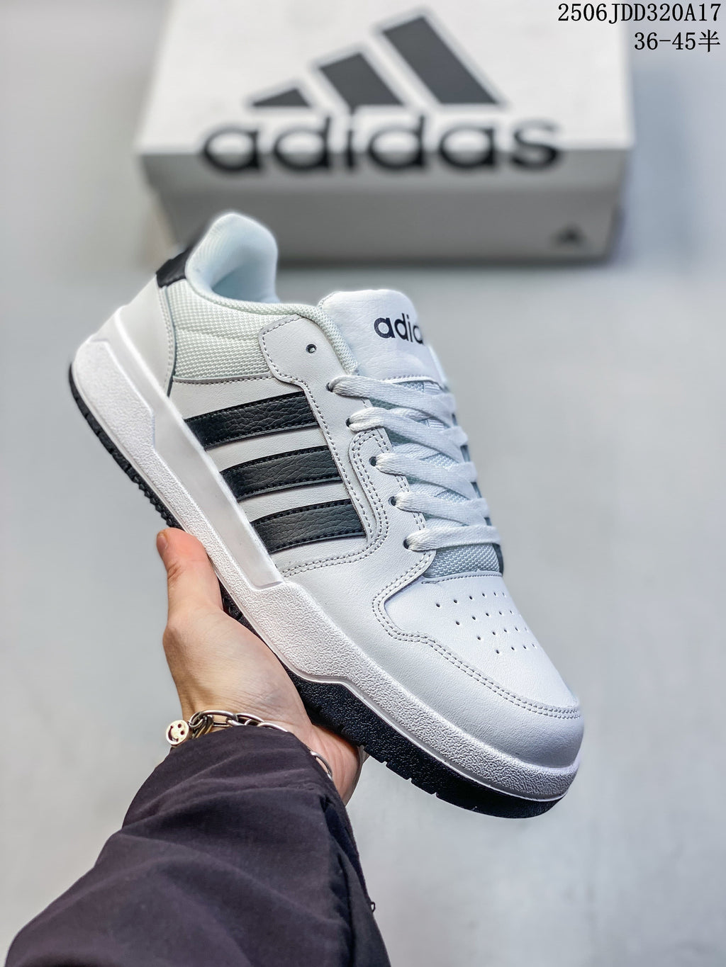 White adidas Entrap sneaker with black stripes and black outsole