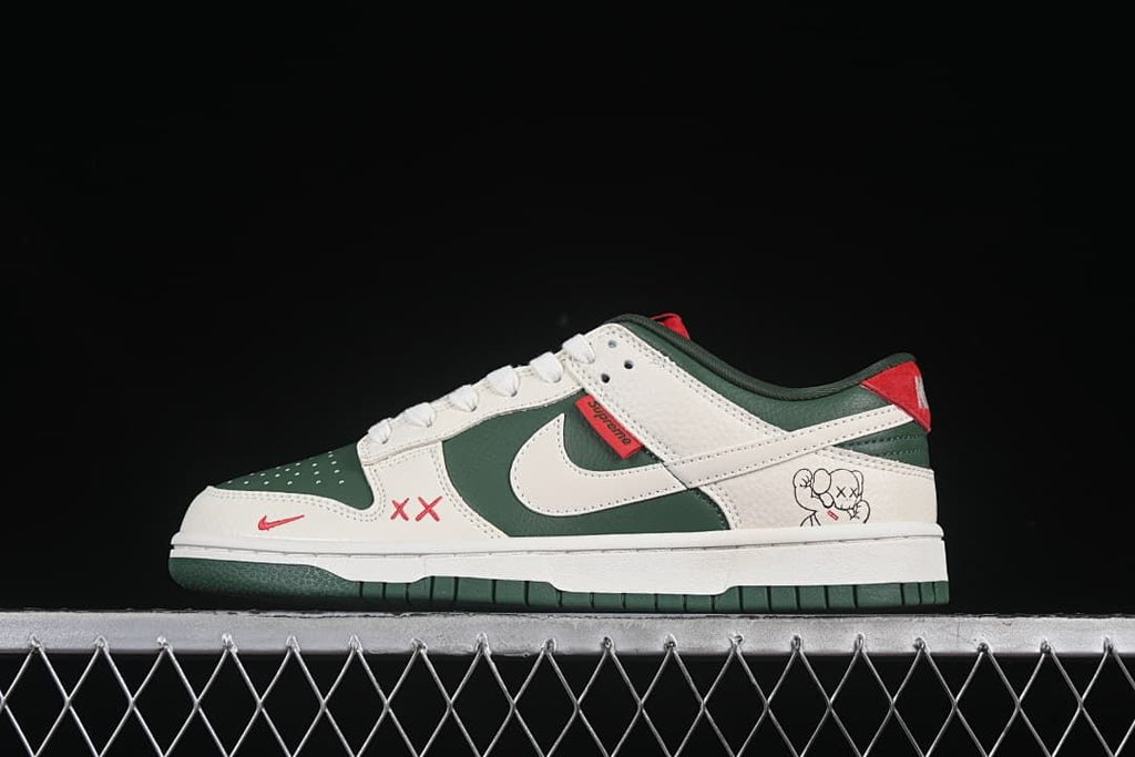 Side view of a green and sail low-top sneaker with red accents and illustrated side details