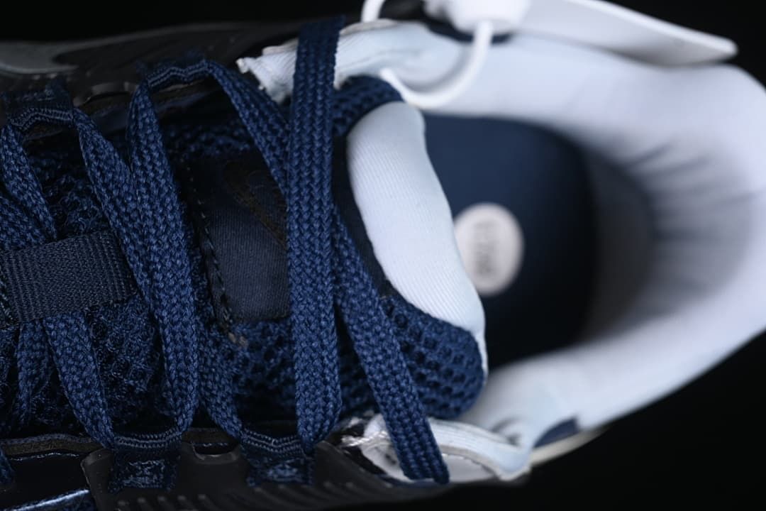 Close-up of navy laces and tongue