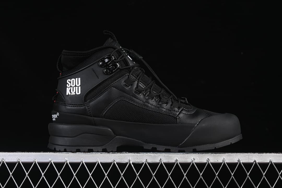 Side profile of the black mid-height hiking shoe