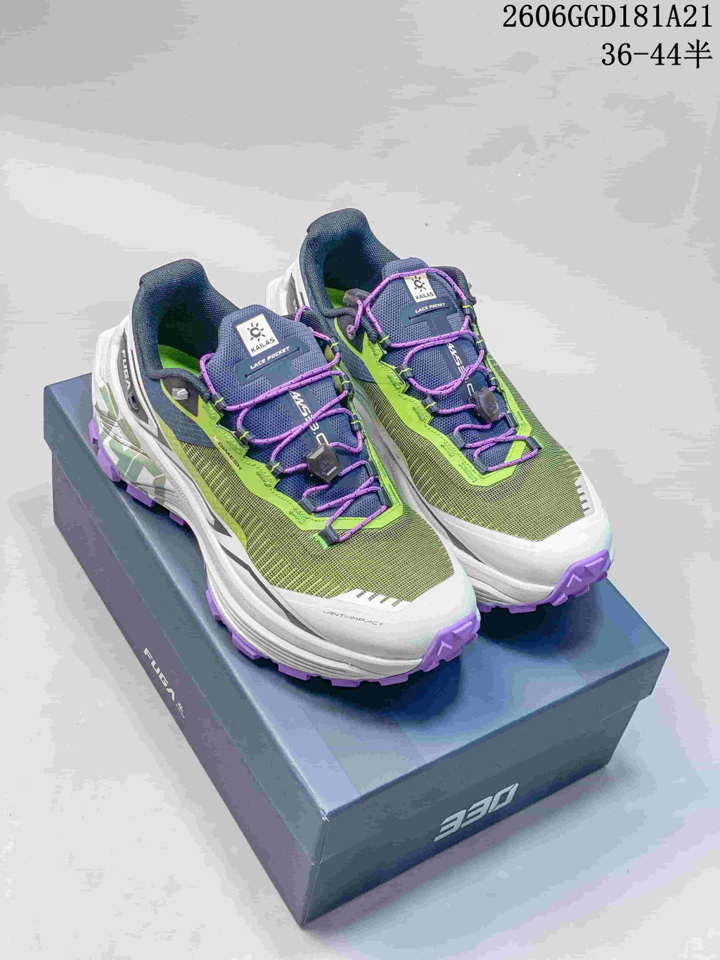 Pair of green, navy, white, and purple Kailas FUGA EX BOA trail shoes on a box; image text shows 36–44.5.