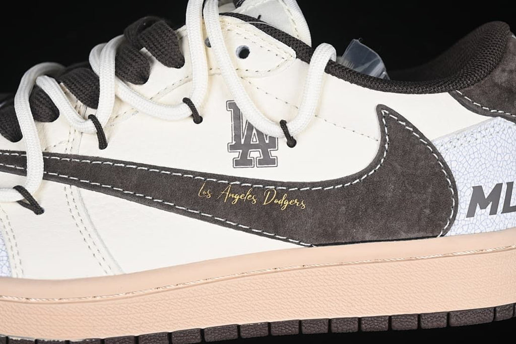 Close-up of side Swoosh, layered laces, and Dodgers detailing