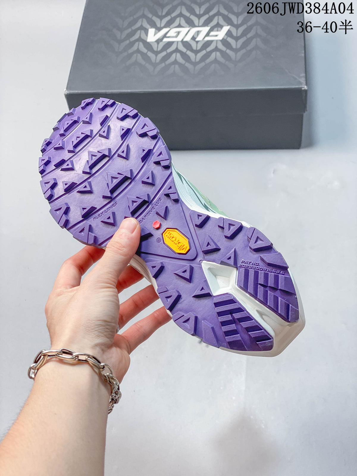 Close-up of the purple lugged outsole on a Kailas Fuga EX3 shoe