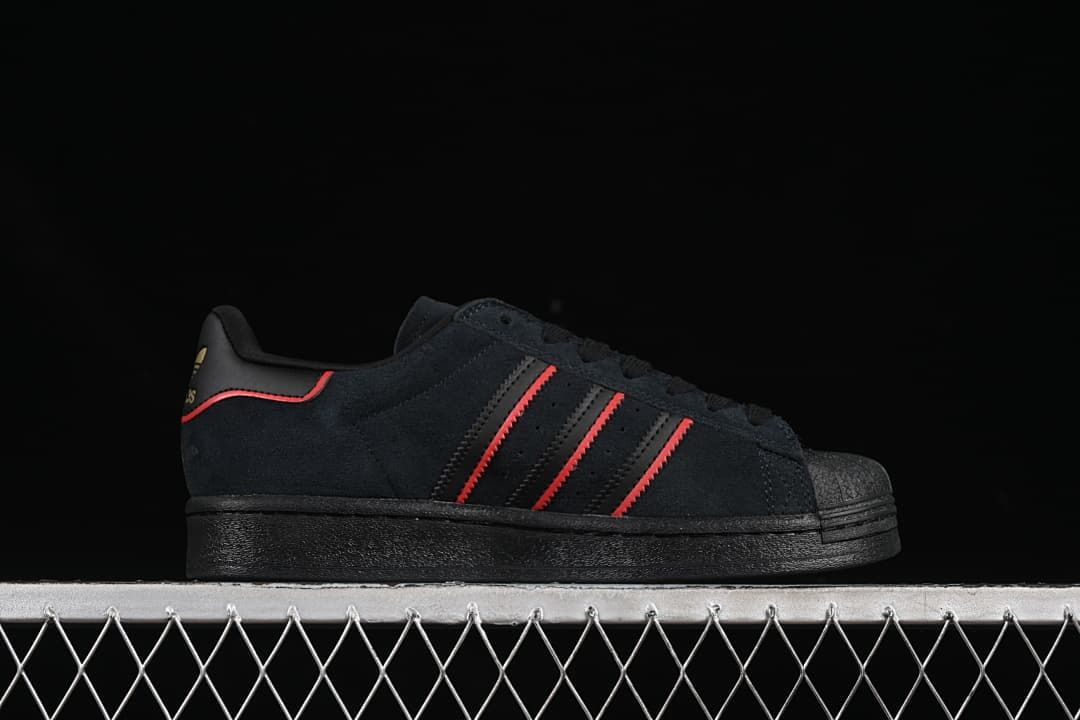 Side profile showing red stripes and a black sole
