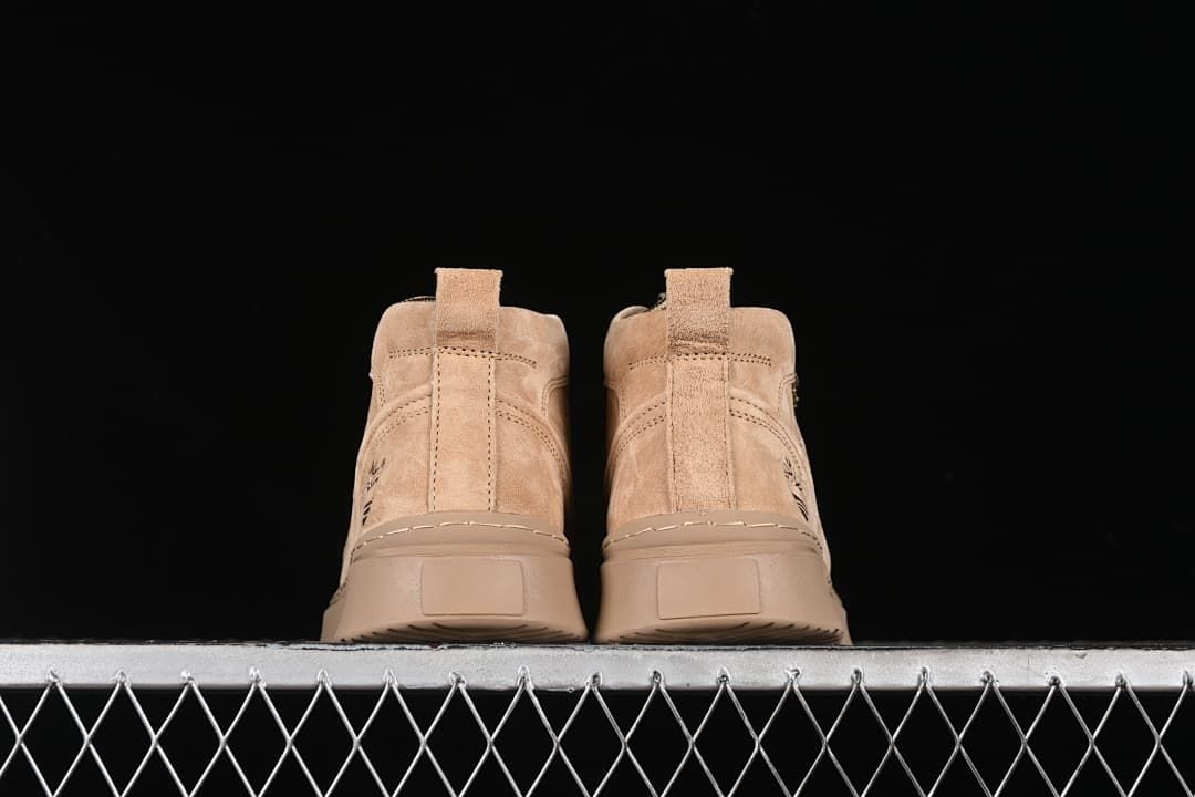 Rear view of the pair showing pull loops and soles
