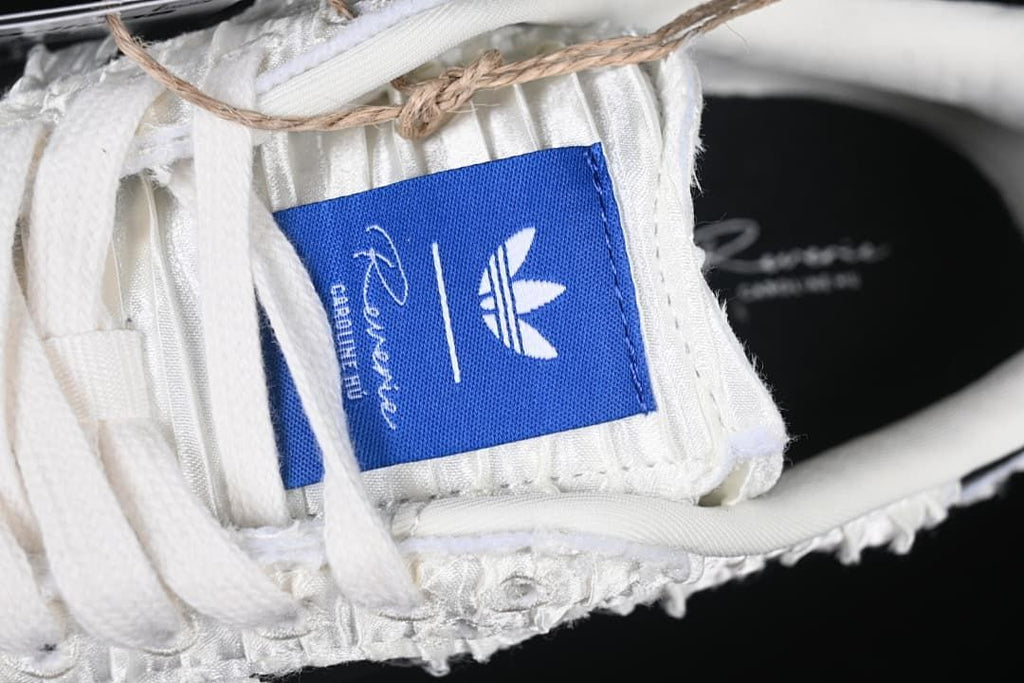 Close-up of the blue tongue label and white laces