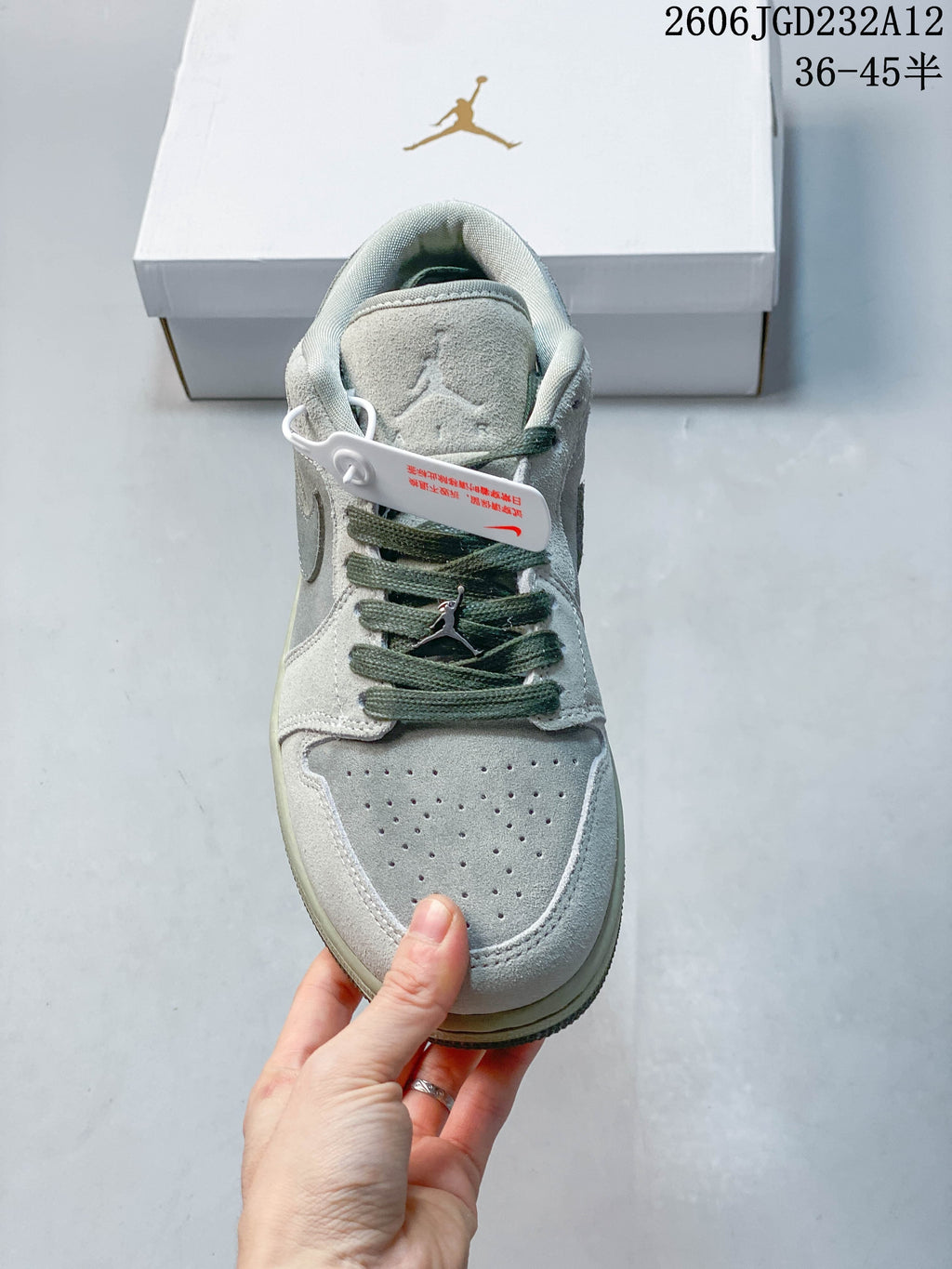 Front view showing the perforated toe and green laces