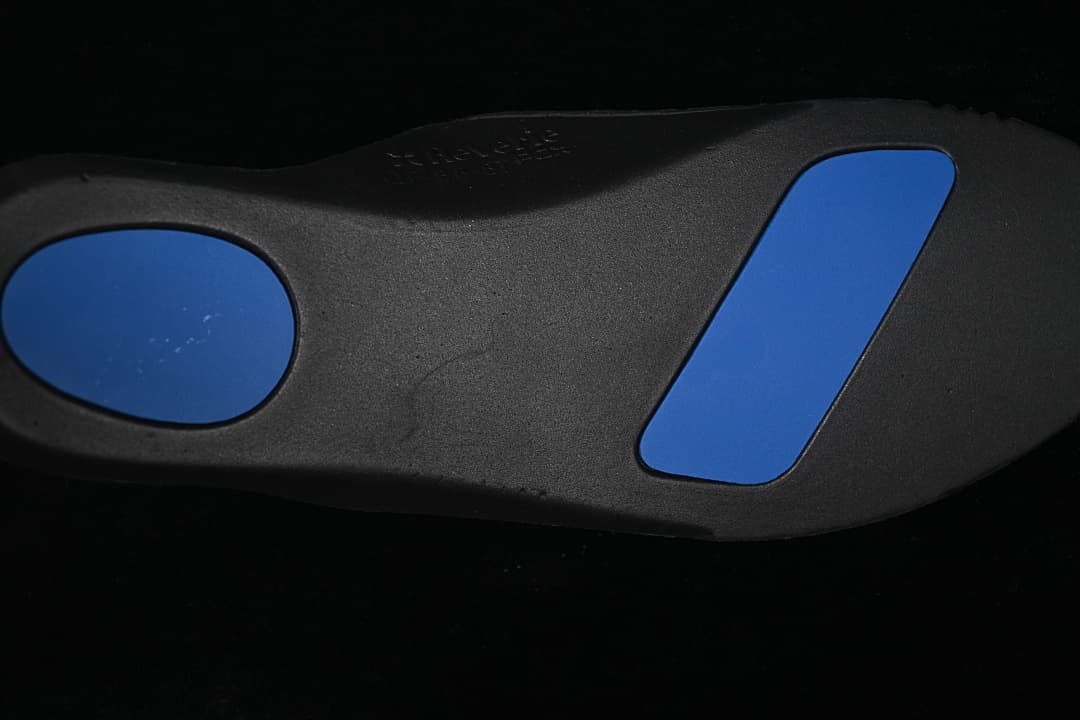 Close-up of the outsole with blue inserts