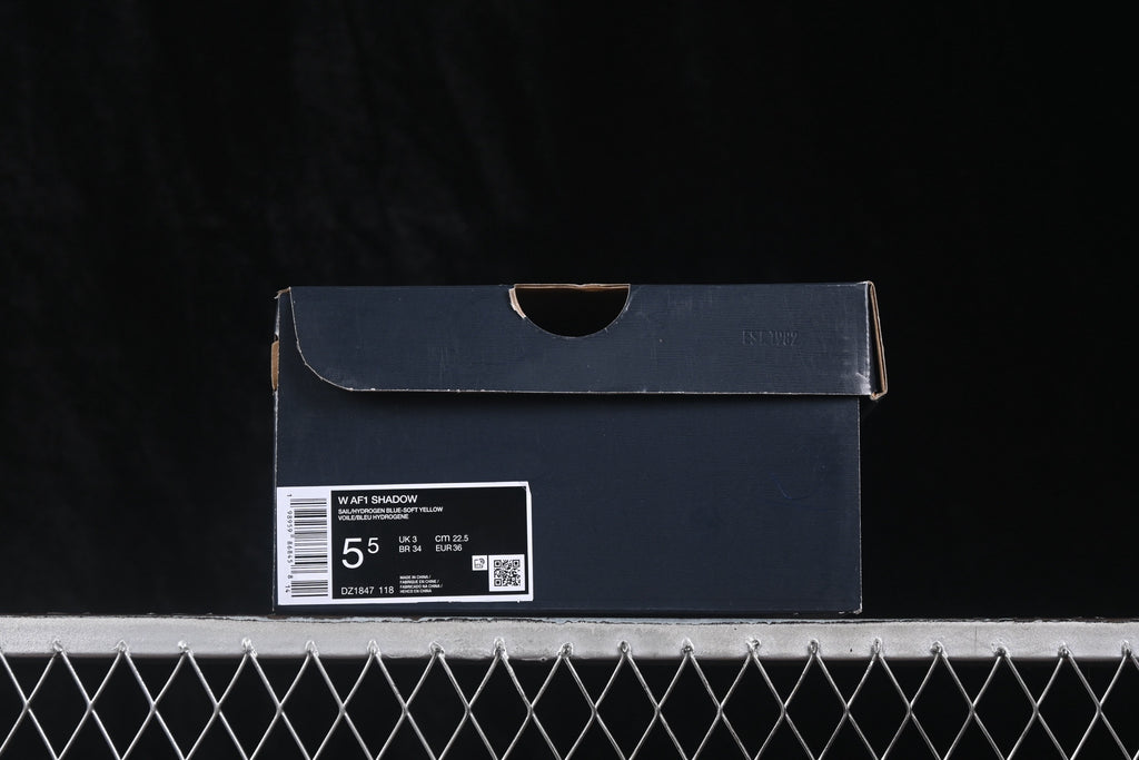Black shoe box with a product label showing Air Force 1 Shadow, style code DZ1847-118, and EU 36 on the photographed sample.