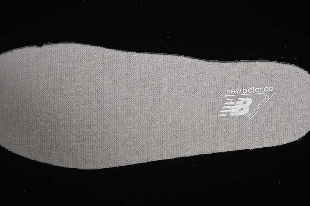 Textured insole with New Balance branding