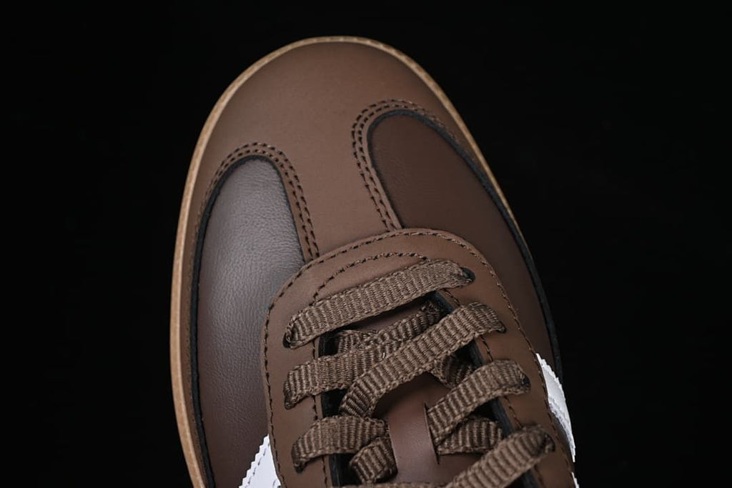 Top view of the brown sneaker toe and lace area