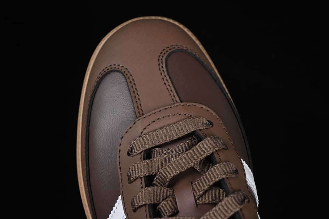 Top view of the brown sneaker toe and lace area