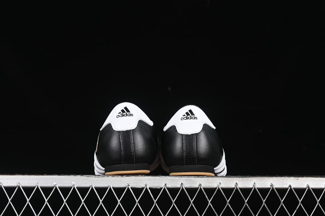 Rear view of the pair with white heel panels and gum-colored outsole edges.