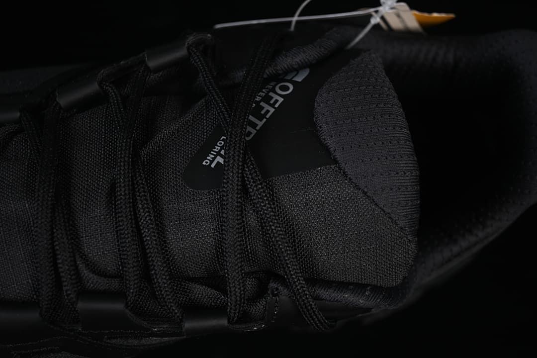 Top view of black laces and tongue