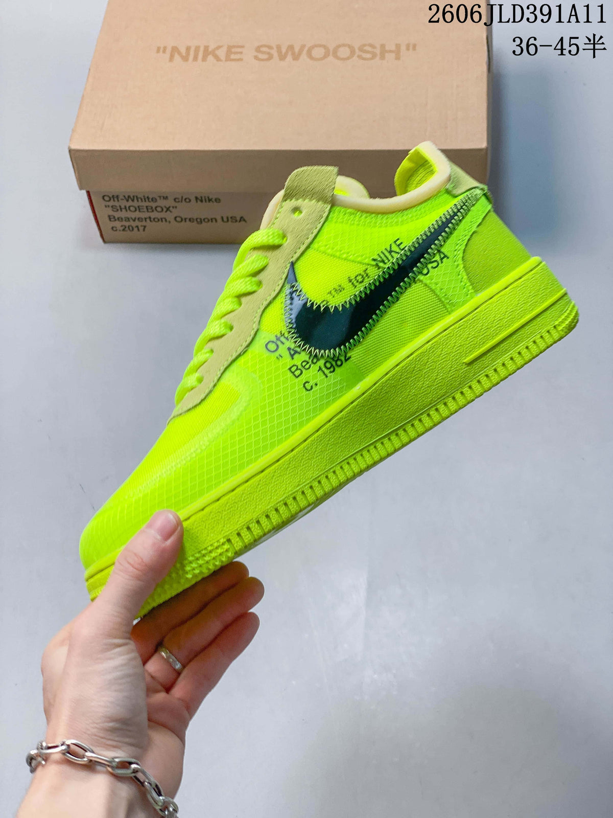Side view showing a dark Swoosh, bright green upper, and “AIR” midsole lettering
