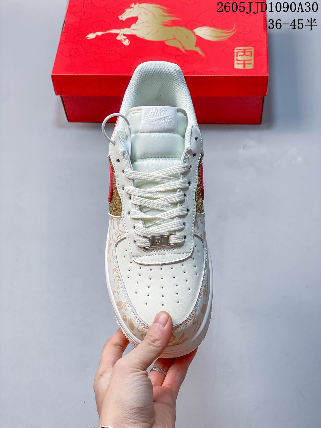 Front view of the sneaker showing its perforated toe and lace-up closure