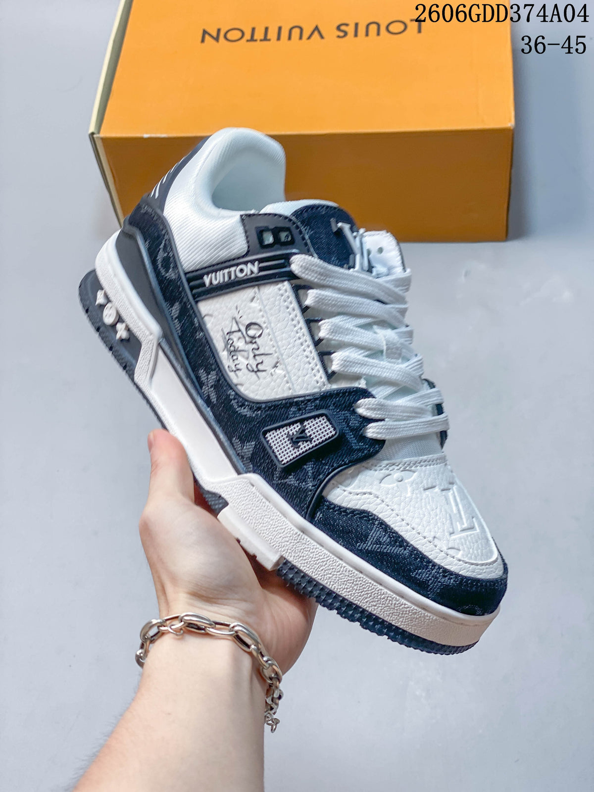 Close side view of a dark blue and white Trainer Low sneaker