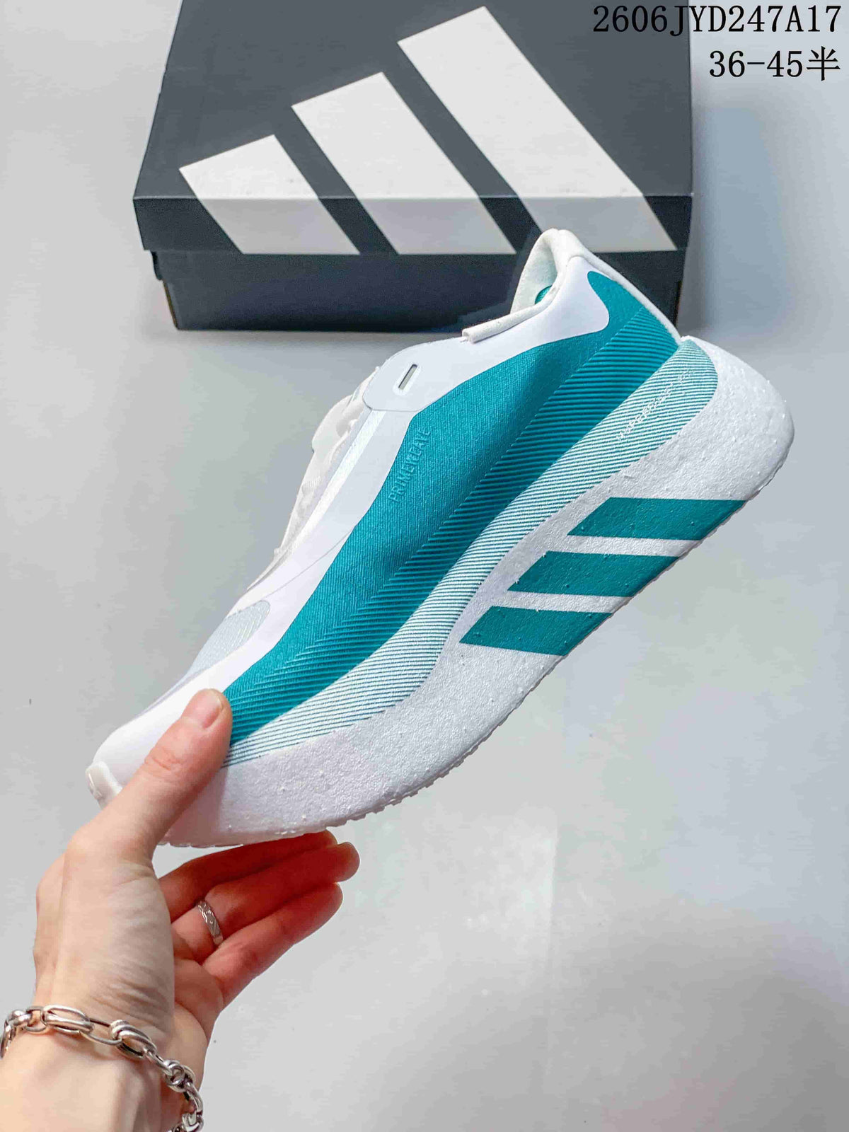 Side view of a white and teal sneaker showing its sculpted sole and three stripes