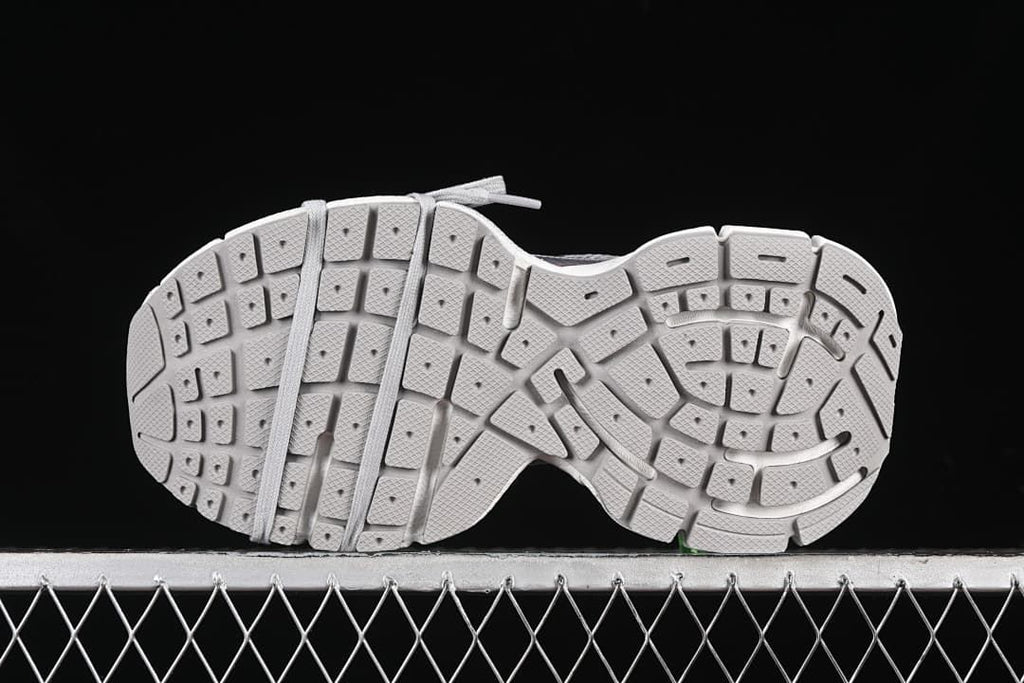 Underside view showing the segmented tread pattern