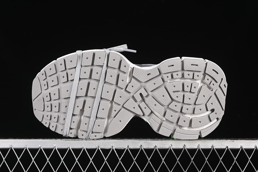 Underside view showing the segmented tread pattern