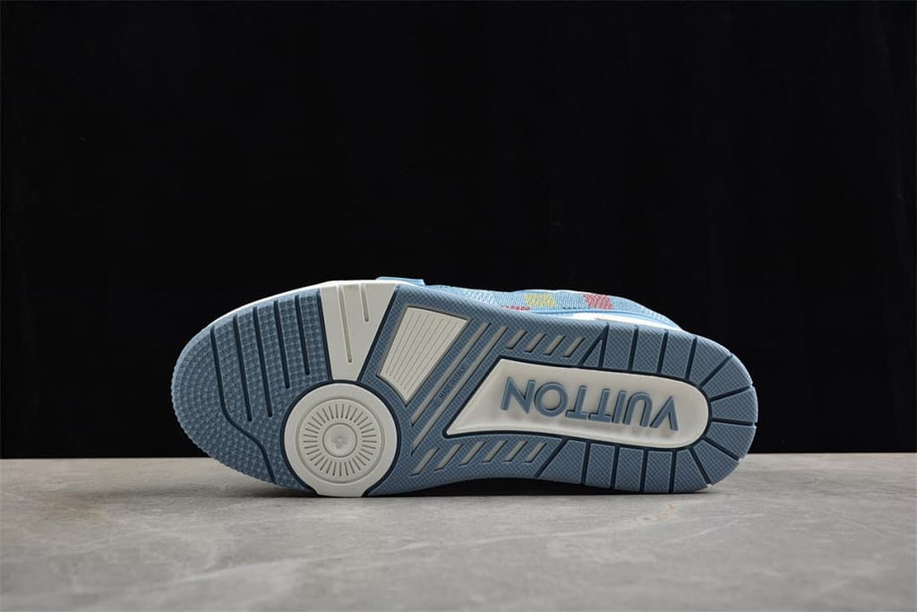 Underside view showing the blue and white sneaker outsole.