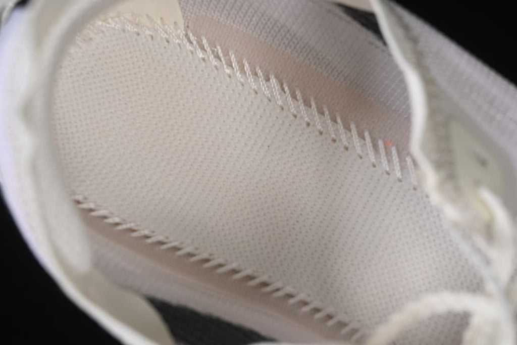 Close-up of the textured inner lining and stitching.