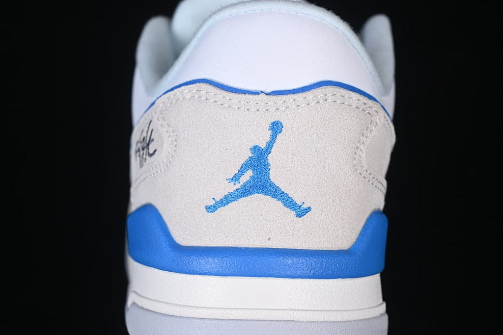Rear view showing the blue heel logo and layered heel panels