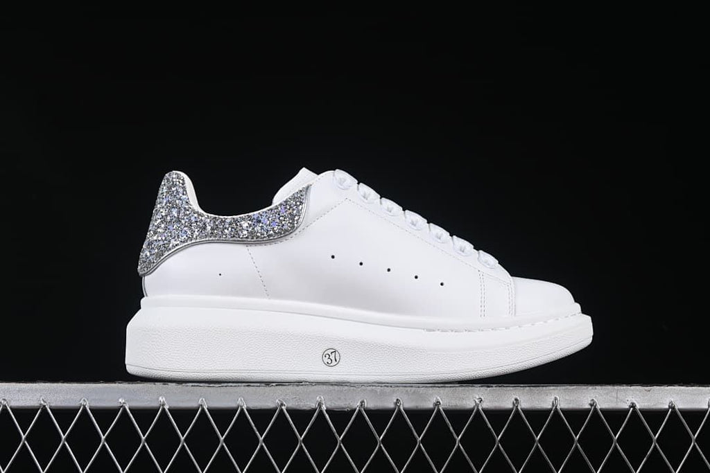 Side view of the shoe with a circled 37 marking on the sole.