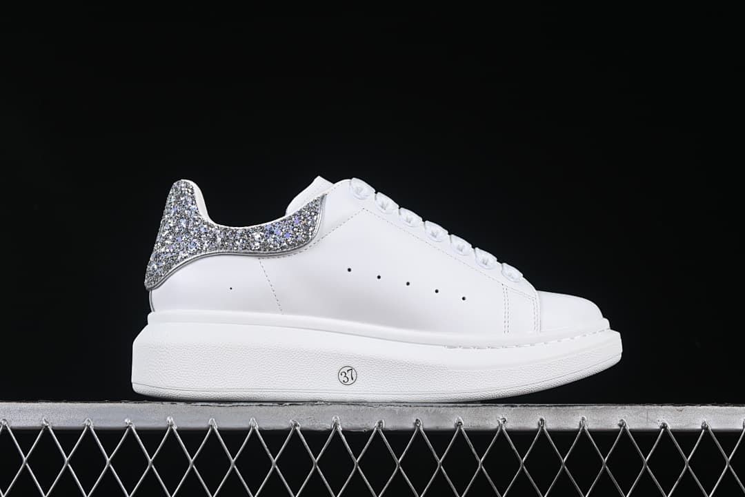 Side view of the shoe with a circled 37 marking on the sole.