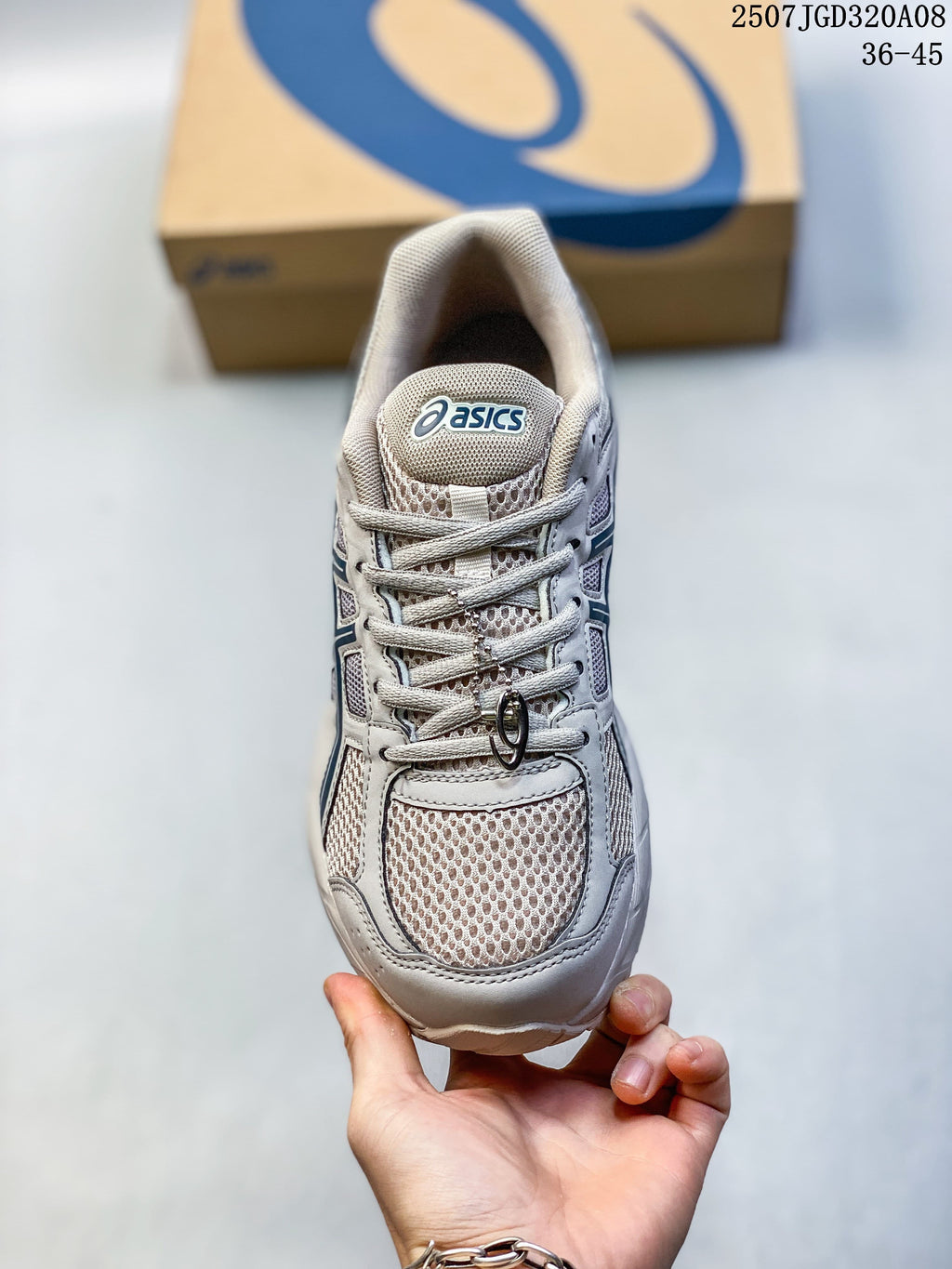 Top view of the gray lace-up running shoe with mesh panels