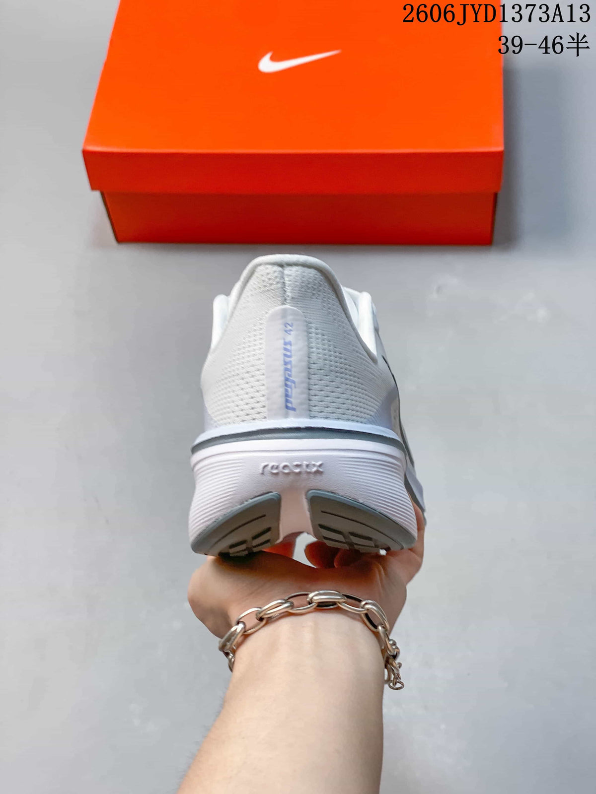 Rear view of a white Nike Pegasus 42 running shoe