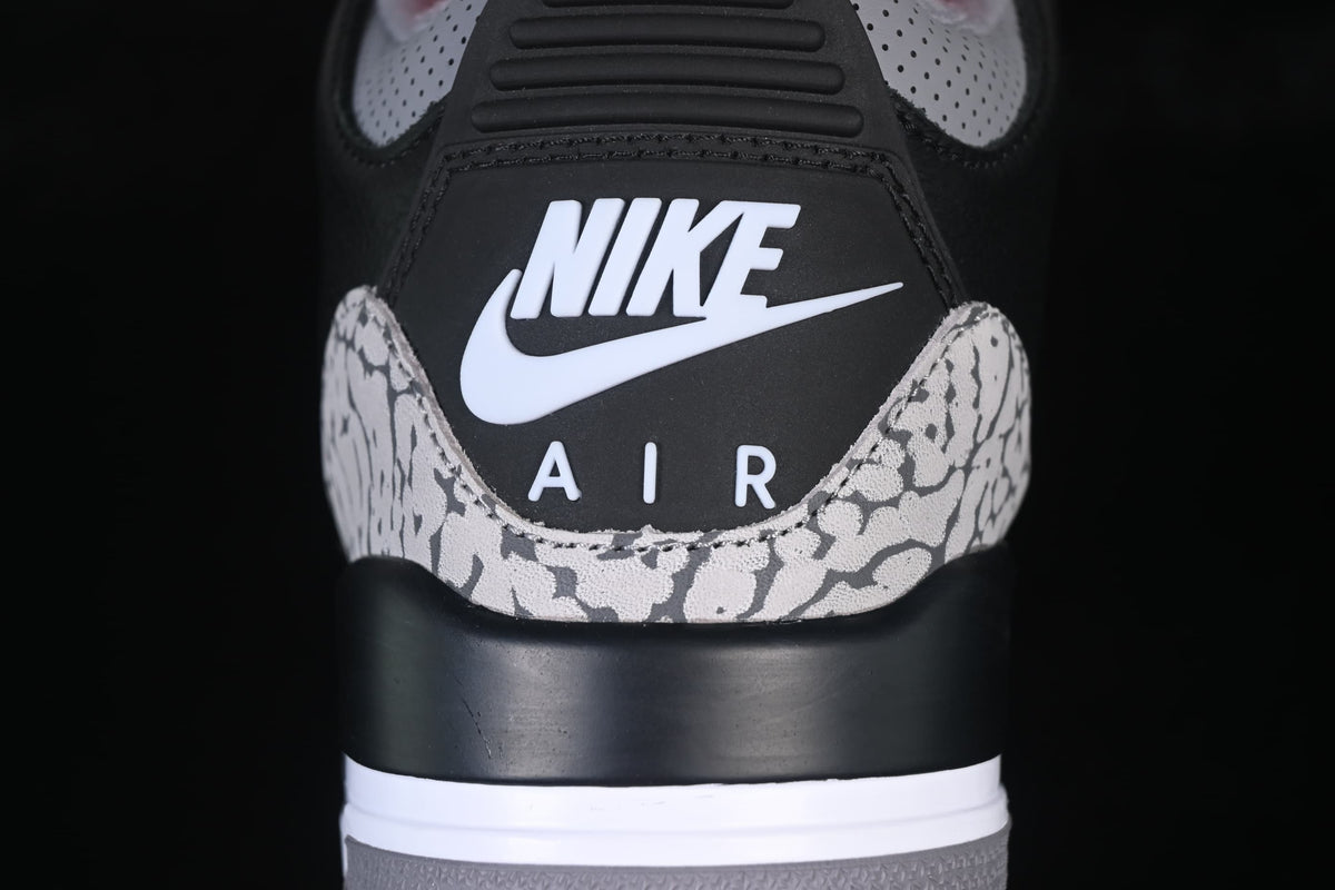 Rear close-up showing heel branding and cement-pattern heel overlays