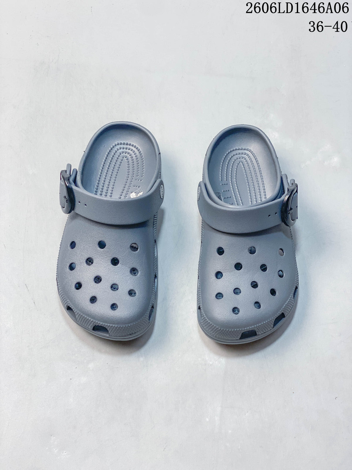Pair of gray Crocs Classic Clogs viewed from above, with ventilation holes and heel straps; image also displays size range 36–40.