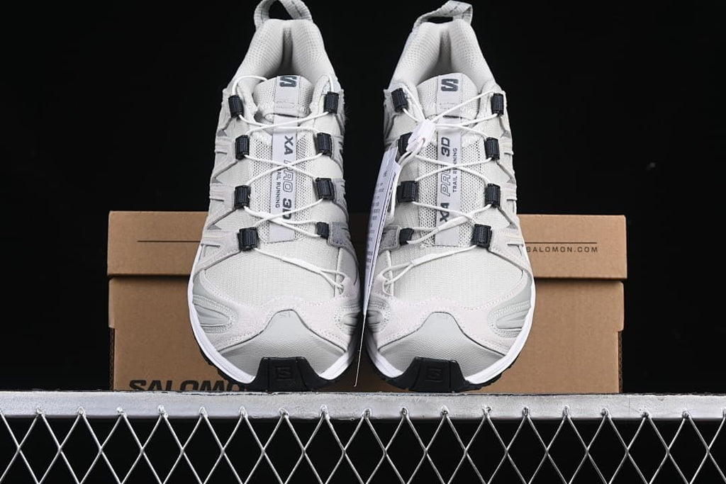 Front view of the pair positioned on the shoe box
