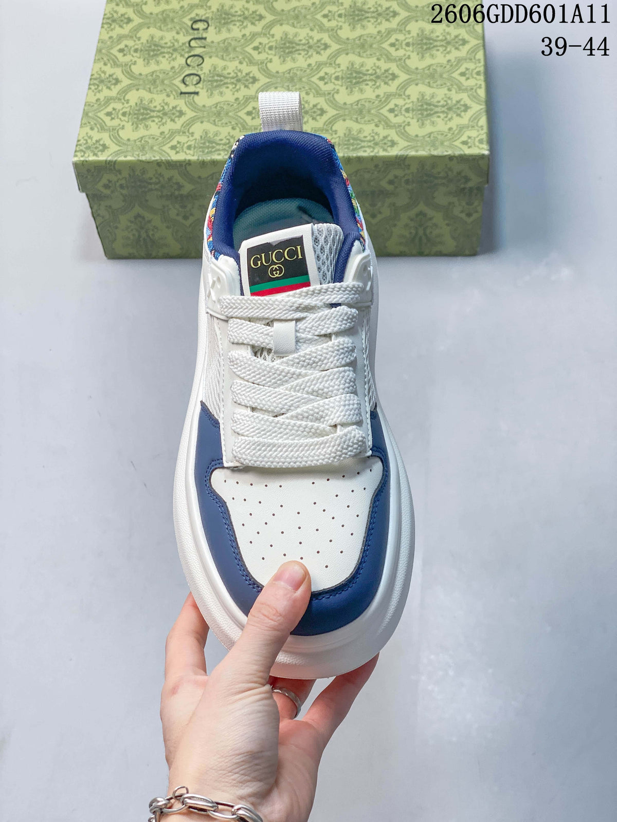 Top view showing the perforated toe, lace-up front and blue accents.
