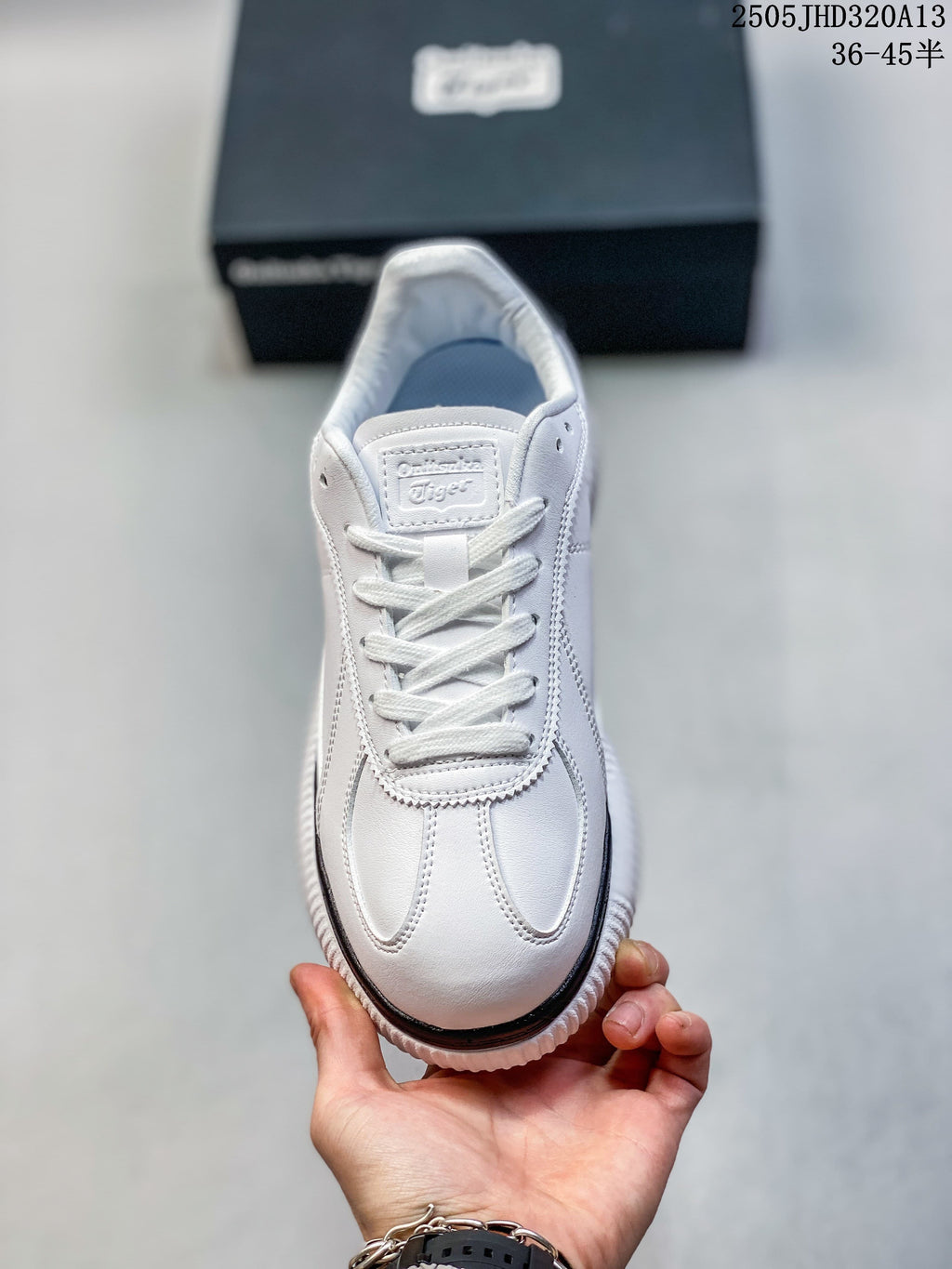 Top view of the white lace-up sneaker with stitched toe panels.