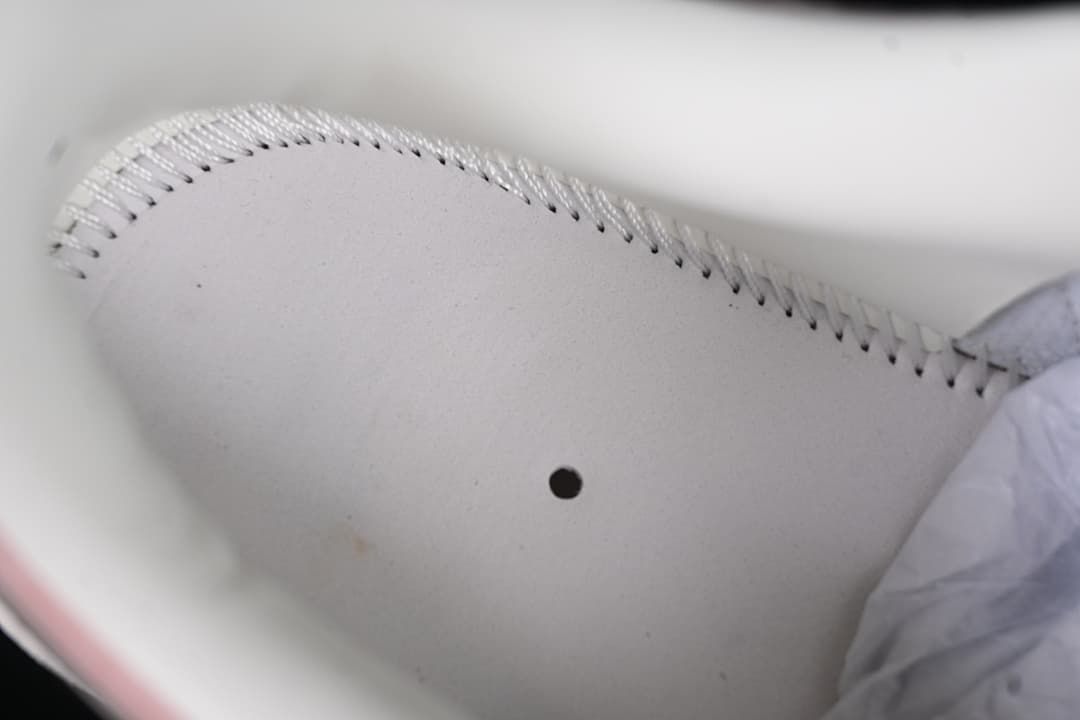 Close-up of the shoe interior and stitching.