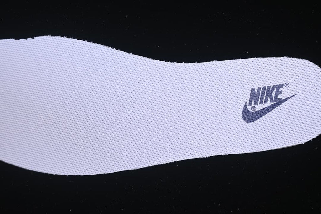 Close-up of a white insole with a Nike logo