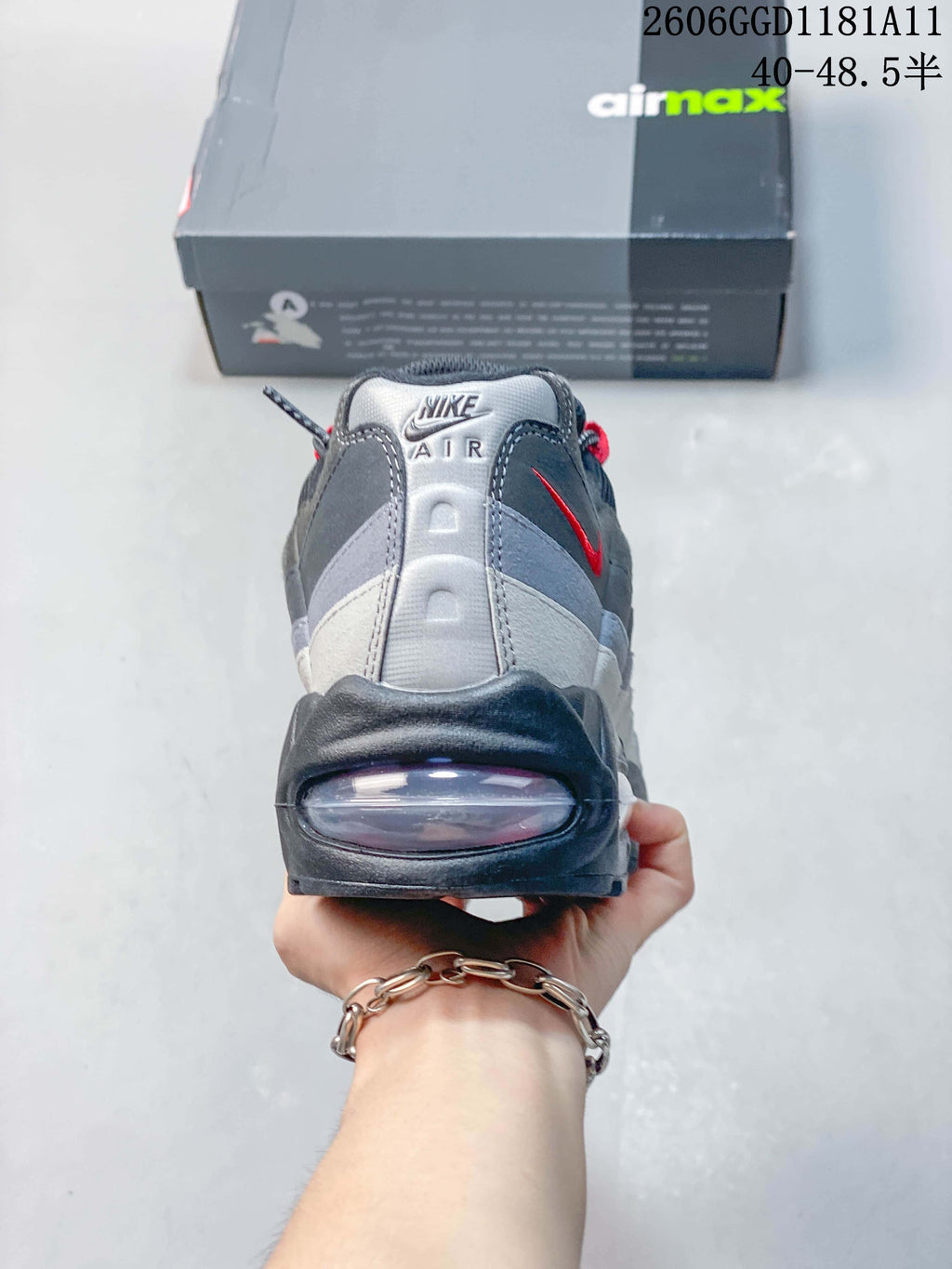 Rear view showing the heel cushioning unit and layered grey panels