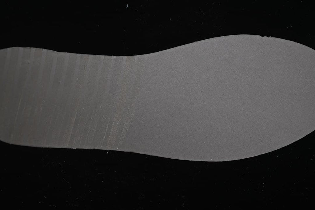 Outsole of the light blue and white low-top sneaker