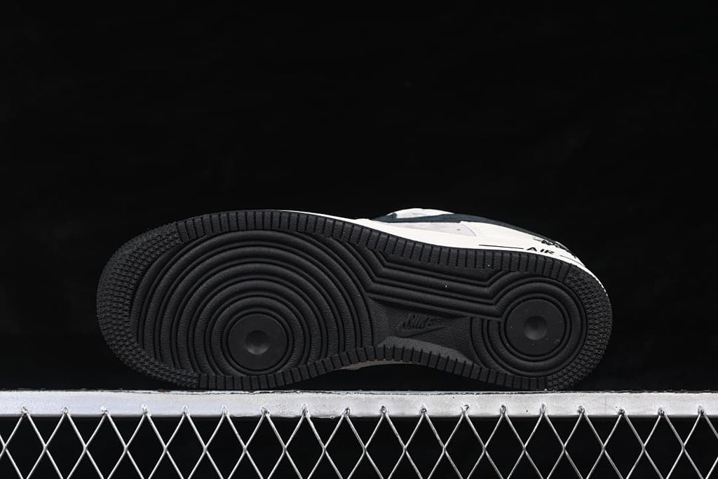 Underside view showing the black circular traction pattern.