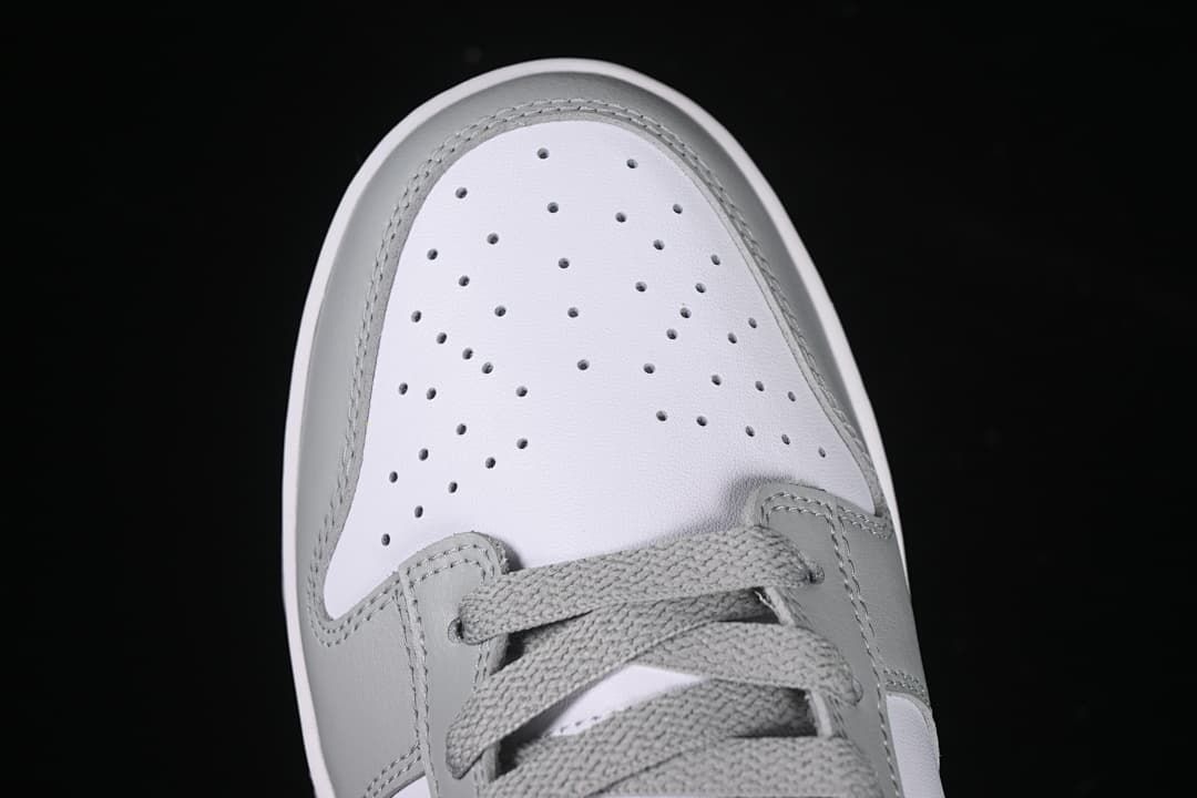 Top view of the perforated white toe and grey overlays