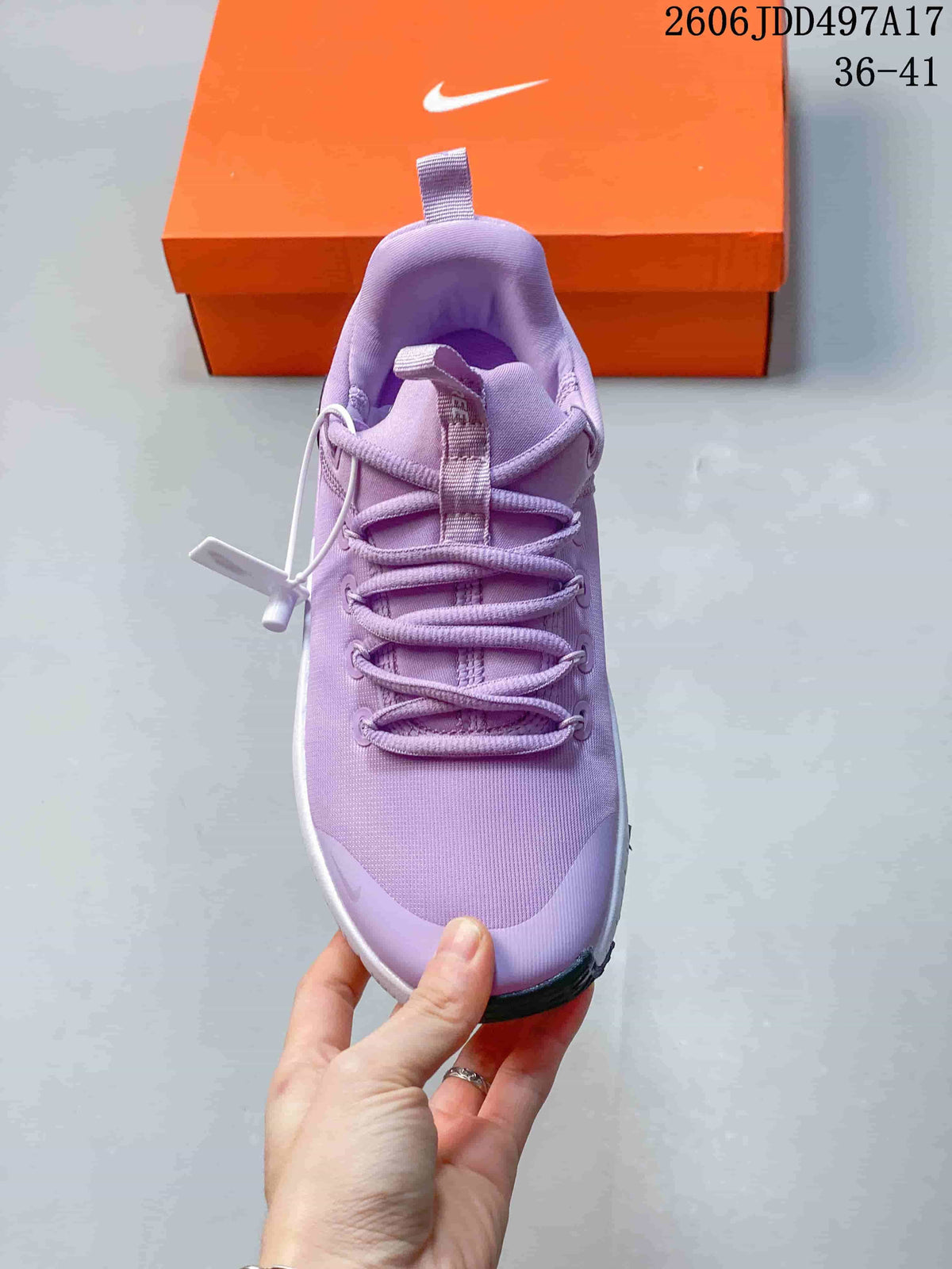 Top view of a lavender training shoe with lace-up closure