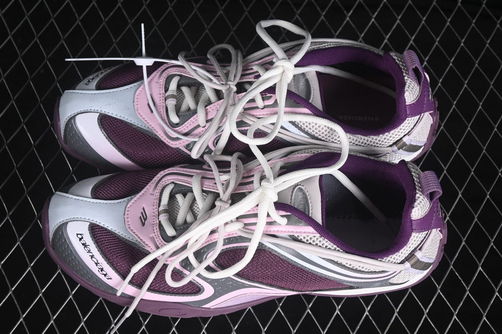 Overhead view of the pair highlighting the lace-up construction, purple lining, mesh panels, and contrasting overlays.