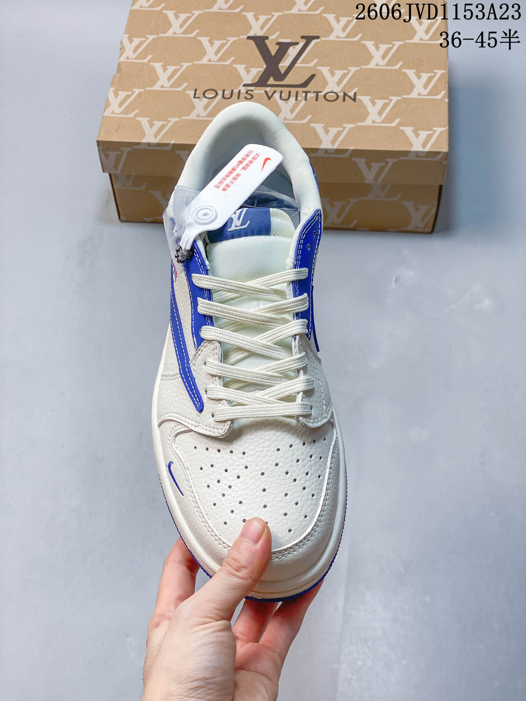 Top view highlighting the perforated toe, laces, and blue overlays