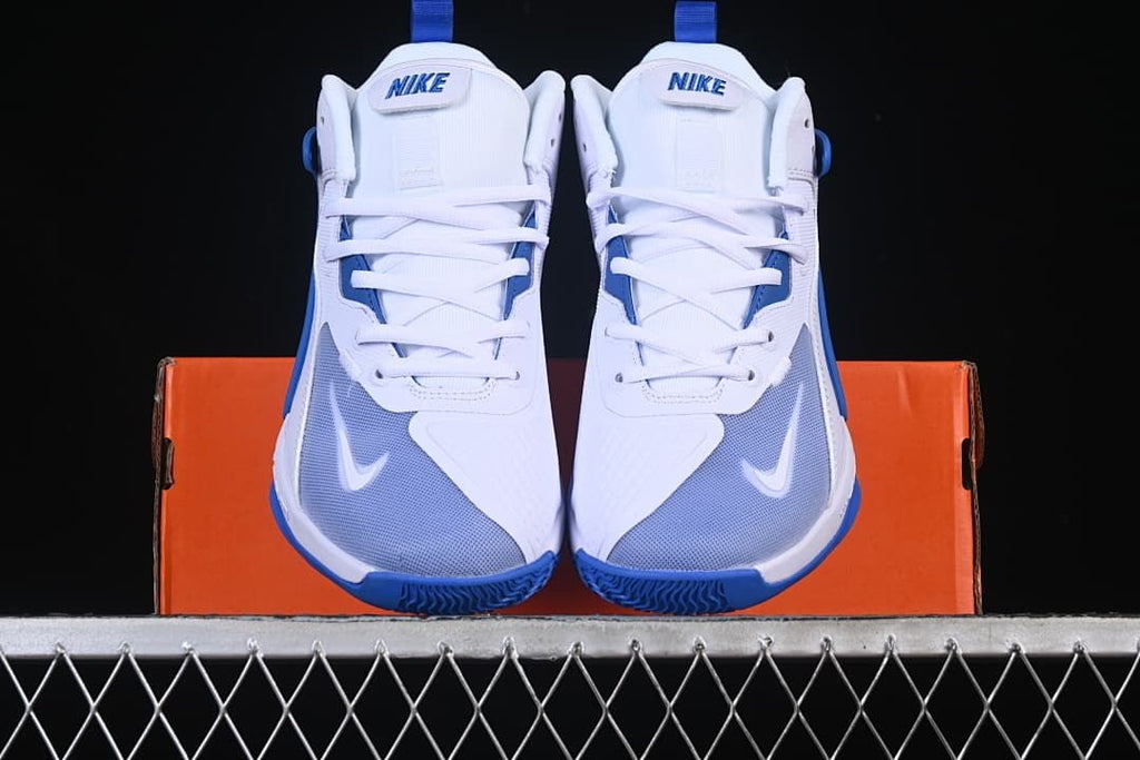 Front view of the pair showing the toe panels and blue outsole