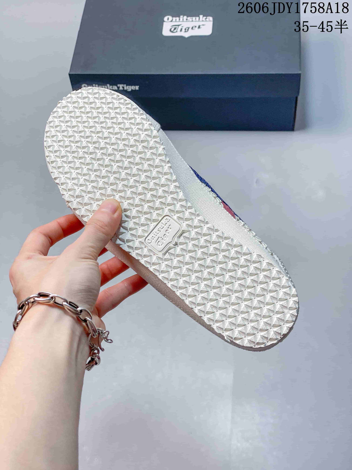 Textured outsole of an Onitsuka Tiger Mexico 66 Sabot sneaker