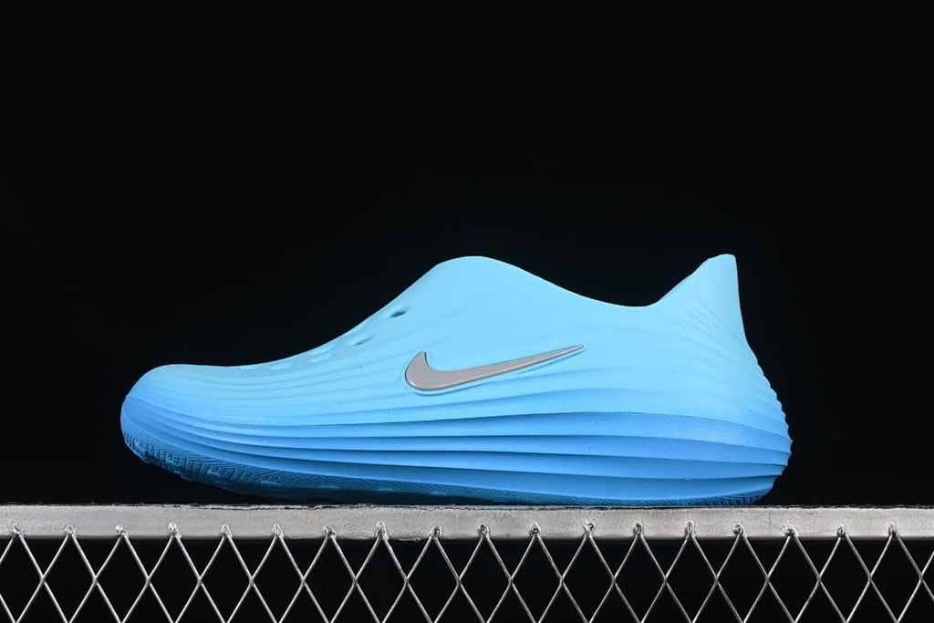 Blue clog shown in side profile