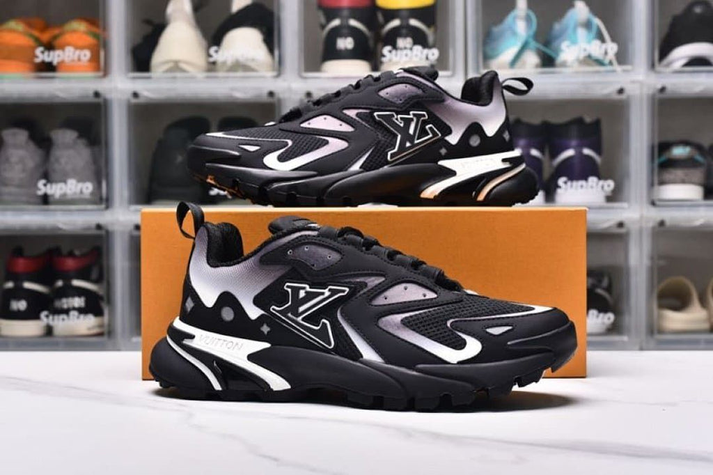 Two side profiles showing the black and white sneaker design