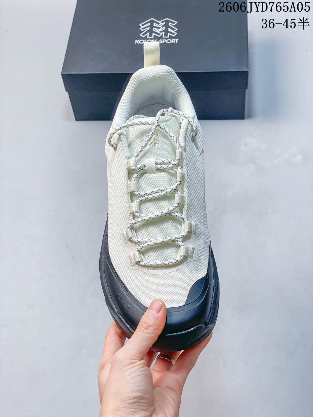 Top view showing the patterned laces, tongue and reinforced toe.